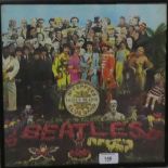 Beatles Sgt. Peppers Lonely Hearts Club Band, album, in a glazed frame, 33 x 33cm