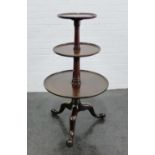 19th century mahogany three tier dumb waiter on tripod support, 112cm