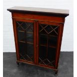 Edwardian mahogany and inlaid bookcase, with pair of astragal glazed doors and cabriole supports,