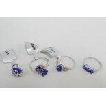 Three 9 carat gold tanzanite set dress ring and a white gold and tanzanite pendant (4)