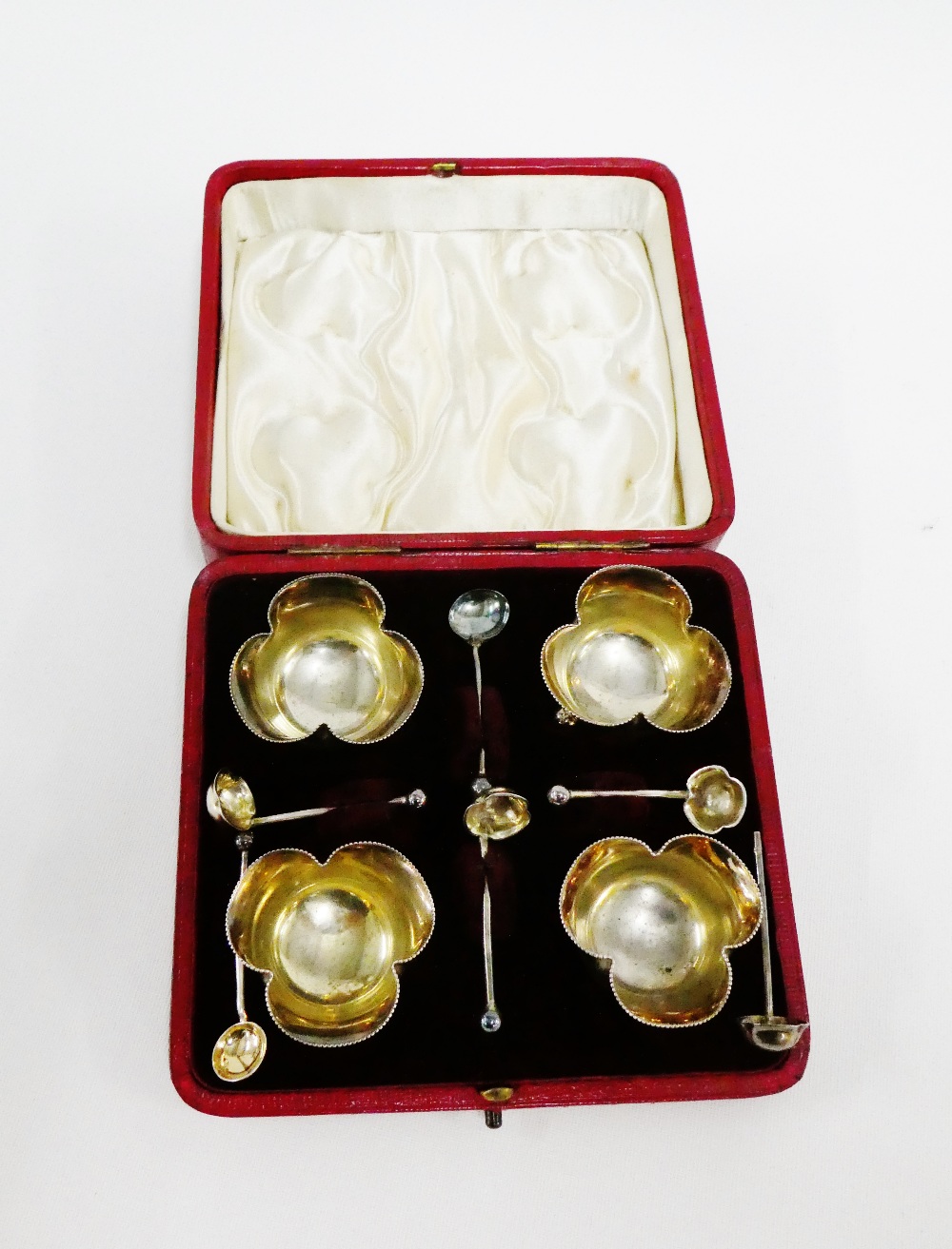 Edwardian set of four silver salts and salt spoons by Horace Woodward & Co, London 1909, in original