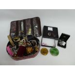 A large quantity of costume jewellery to include dress rings, beads, bracelets and brooches together