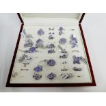 A quantity of silver and white metal tanzanite set jewellery to include dress rings, earrings and