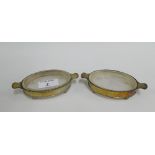 A pair of George V silver and glass oval butter dishes, Chester 1911, 13cm long (2)