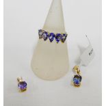 9 carat gold tanzanite five stone set dress ring and two tanzanite set and 9 carat gold pendants (3)