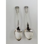 A pair of early 19th century Kings pattern silver teaspoons with TL, saltire, anchor and J