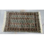 Bokhara green rug, 170 x 94cm