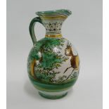 Tin glazed continental pottery jug painted with a deer and a landscape