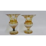 Two Bohemian glass goblets / vases with amber acid etched fruit and vine pattern, together with four