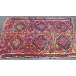 Kelim rug with six lozenges to the blue and red field, 230 144cm