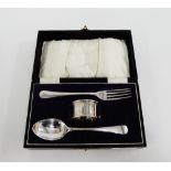 George V silver fork, spoon and napkin ring set in leather fitted case, Birmingham 1929