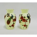 Pair of opaline glass baluster vases with peacock and flowering branch pattern, painted and beaded