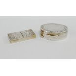 Two contemporary silver pill boxes to include an oval box and another of rectangular form with two