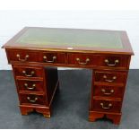 Yewwood desk r the rectangular top with green leather skivver, above two short drawers flanked by