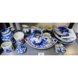 Collection of Delft blue and white pottery to include miniature vases, jugs, steins, serving dish,