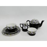 Solian Ware black glazed breakfast set with lilac border and yellow dot pattern, comprising cup,