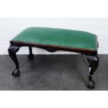 Mahogany framed stool with carved acanthus leaf supports and claw and ball feet, with a green