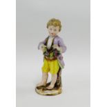 19th century Meissen figure of a boy modelled with floral wreath on a Rococo style base with blue