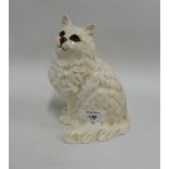 Beswick cat, modelled seated, with green painted eyes with impressed model number 1867 and printed