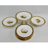 Porcelain dessert service with landscape panels to the centre and gilt edge rims comprising a