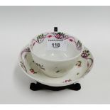 English porcelain Newhall style tea bowl and saucer painted with floral sprays and garlands, (2)