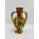 Continental twin handled vase in ochre streaked glaze, 30cm high