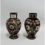 Pair of continental brown glazed pottery baluster vases with incised floral patterns, 19cm high, (2)
