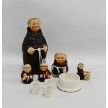 Goebel's Monks four piece cruet set, together with a decanter with three shot glasses to the