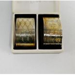 A pair of silver napkin rings, Birmingham 1960, boxed (2)