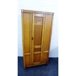 Early 20th century oak wardrobe, the door inlaid with acorn leaf motifs, 186 x 90cm