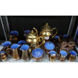 Quantity of Welsh copper lustre pottery to include cups, saucers, jugs, bowls etc., together with