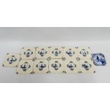 Group of eleven Delft blue and white tiles together with a another smaller, (12)