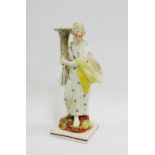 Enoch Wood style pottery figure "Goddess of Plenty" on a square lined base, 24cm high
