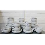 Quantity of Denby white glazed and brown striped teacups, saucers and side plates, (a large lot)