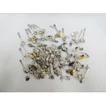 A quantity of white metal souvenir teaspoons, etc (a lot)