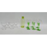 Set of six wine glasses with green glass stems, a green glass cocktail shaker and four etched