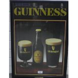 Coloured Guinness poster in a glazed frame, 40 x 58cm