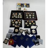 A large collection of Royal Mint UK Proof coin sets ranging in date from 1990 through to 2009,