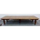 Large late 19th / early 20th century extending oak dining table, the rectangular top with moulded