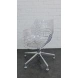 Contemporary clear plastic chair on revolving steel base, 72 x 58cm