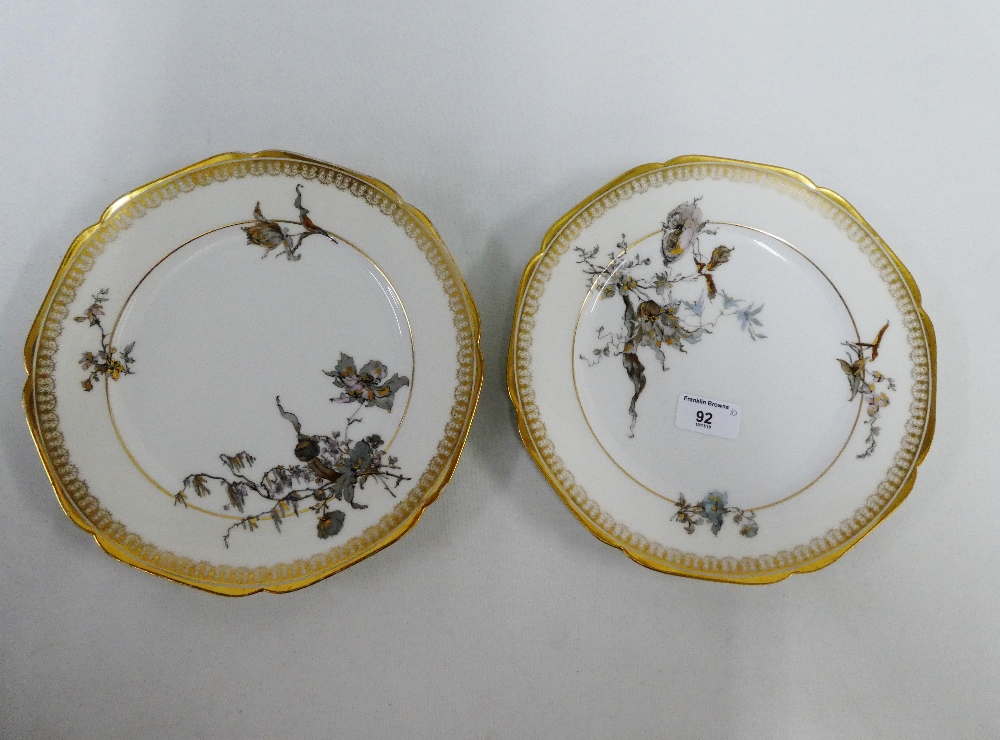 Set of ten Haviland & Co Limoges porcelain plates with gilt edged rims and floral sprays, (10)