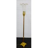 Gilt metal standard lamp with clear glass frilled rim shade with gold fleck inclusions