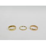 Three 9 carat gold wedding bands (3)