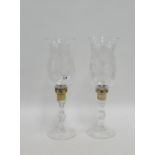 Pair of etched glass storm light/candlesticks with knop stems on circular foot rims, 37cm high, (2)