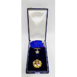 Republic of Chile Order of Merit with blue ribbon sash with red edging and blue leather presentation