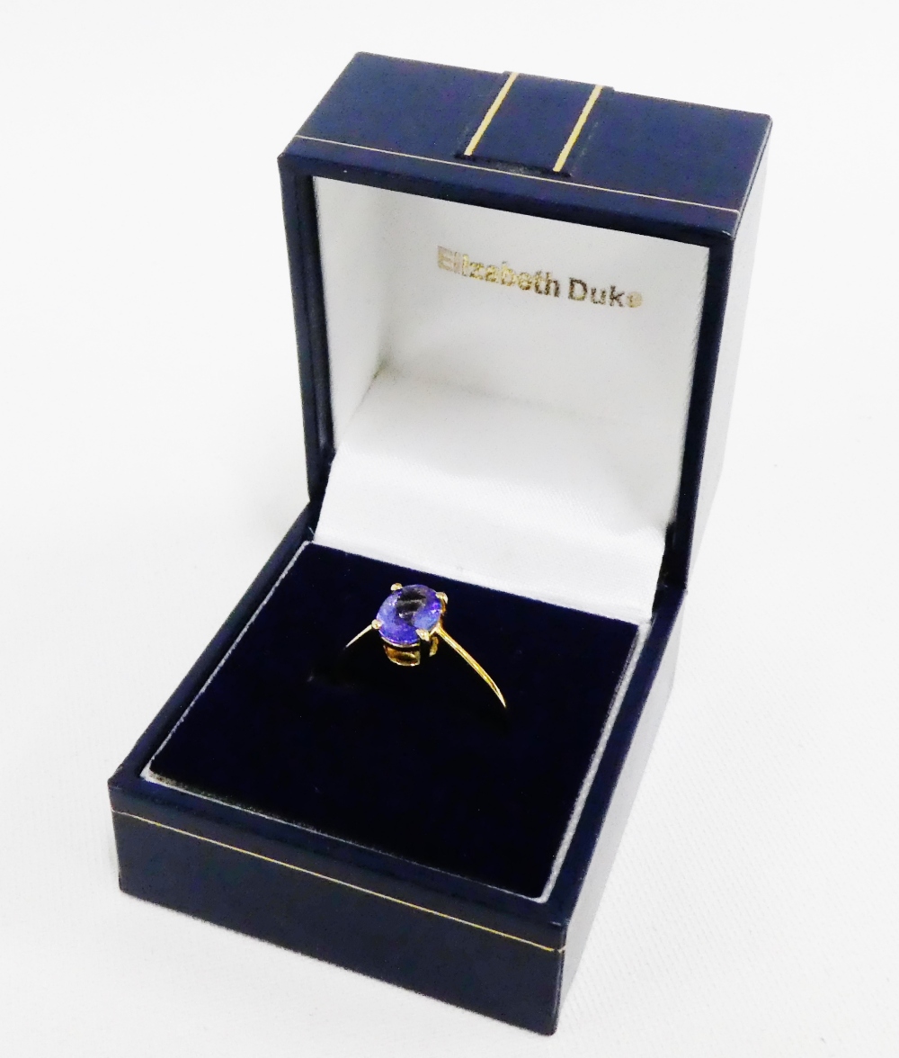 18 carat gold tanzanite claw set dress ring, UK ring size O