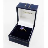 18 carat gold tanzanite claw set dress ring, UK ring size O