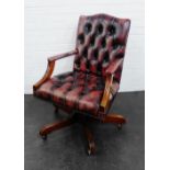 Leather buttonback revolving desk chair, 92 x 62cm