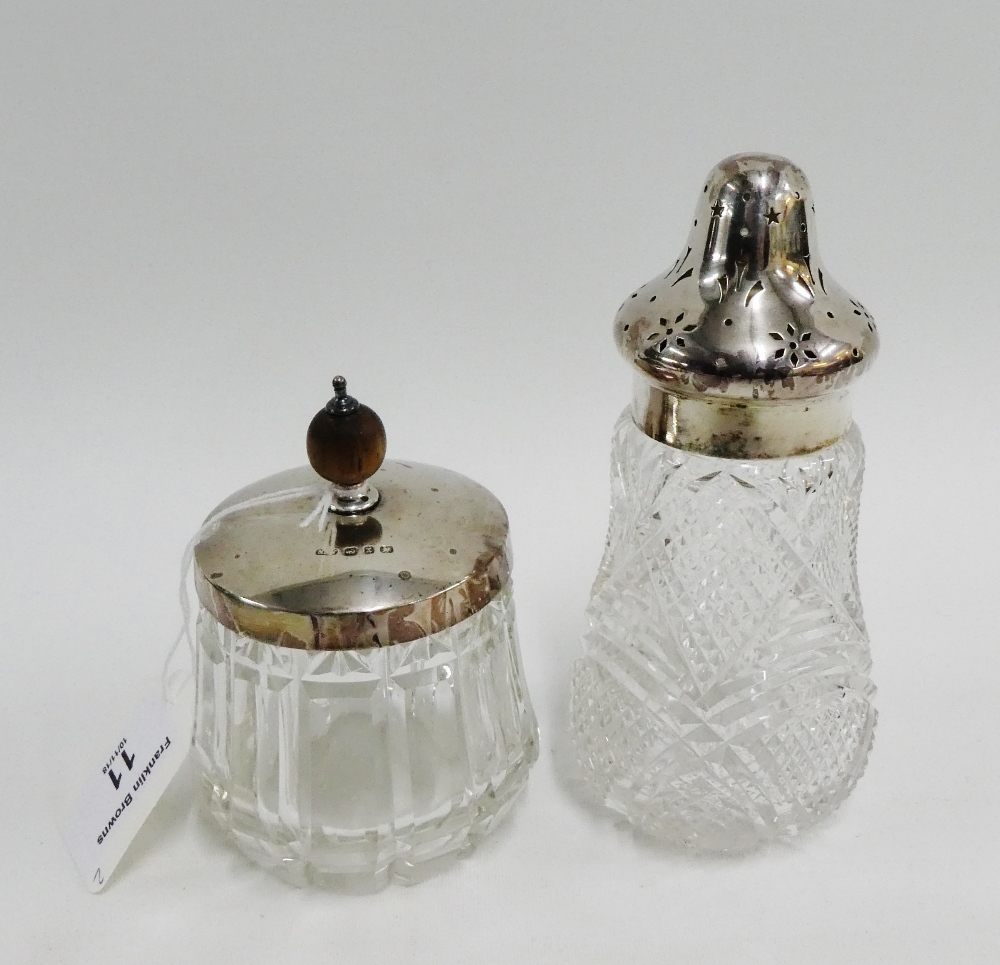 Victorian silver topped and glass sugar castor, London 1895 15cm high, together with a silver topped