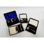 Three early 20th century silver pusher sets together with a cased set of cruets (liners lacking) (4)